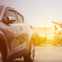 Sun glare in a parking lot full of cars