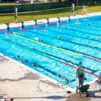 Large pool with active swimmers
