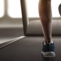 Person running on treadmill for exercise
