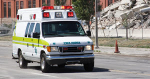 Personal injury lawyers discuss accidents with emergency vehicles. 