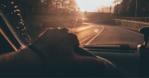 driving car during the sunset