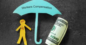 Pennsylvania Workers’ Compensation Paper cut out of an umbrella and stick figure. Symbolizing the shelter workers comp insurance brings.